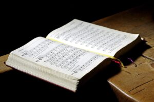 hymn book, a book, to sing